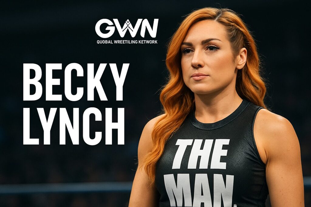 Redheaded female wrestler wearing THE MAN tank