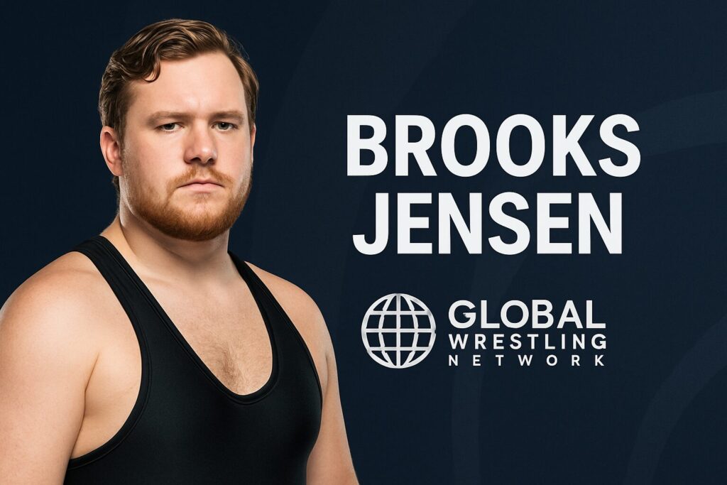 Male wrestler in black singlet, name visible.