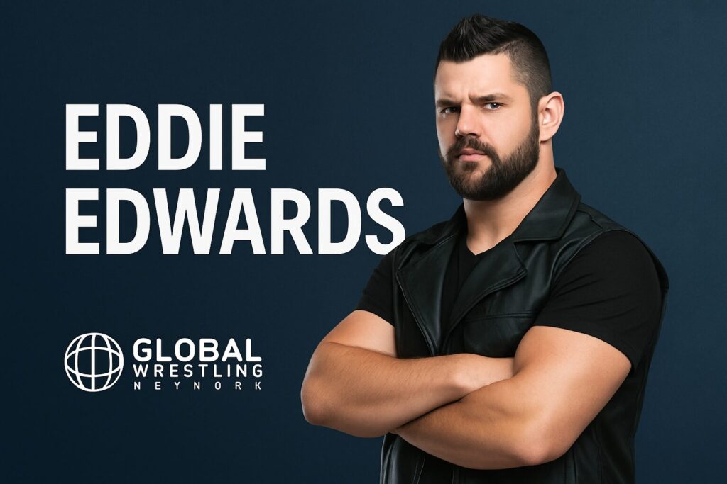 Bearded wrestler Eddie Edwards with arms crossed