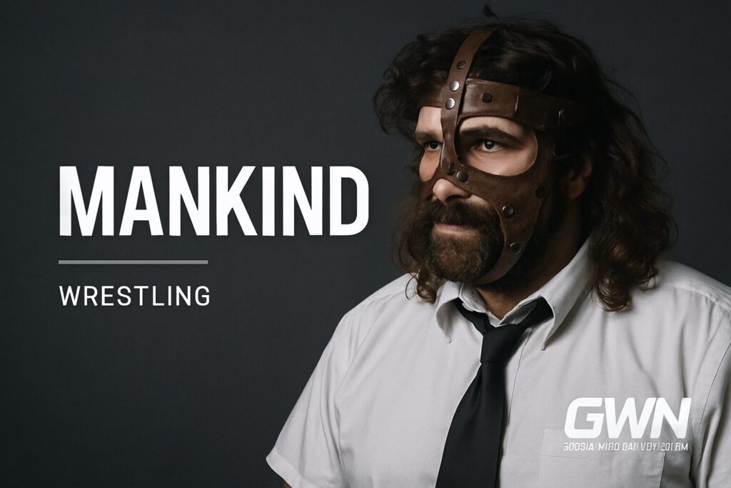 Bearded man wearing leather wrestling mask.